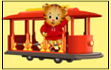 Illustration of an animated tiger cub wearing a red hoodie, standing and waving inside a red trolley car against a yellow background.