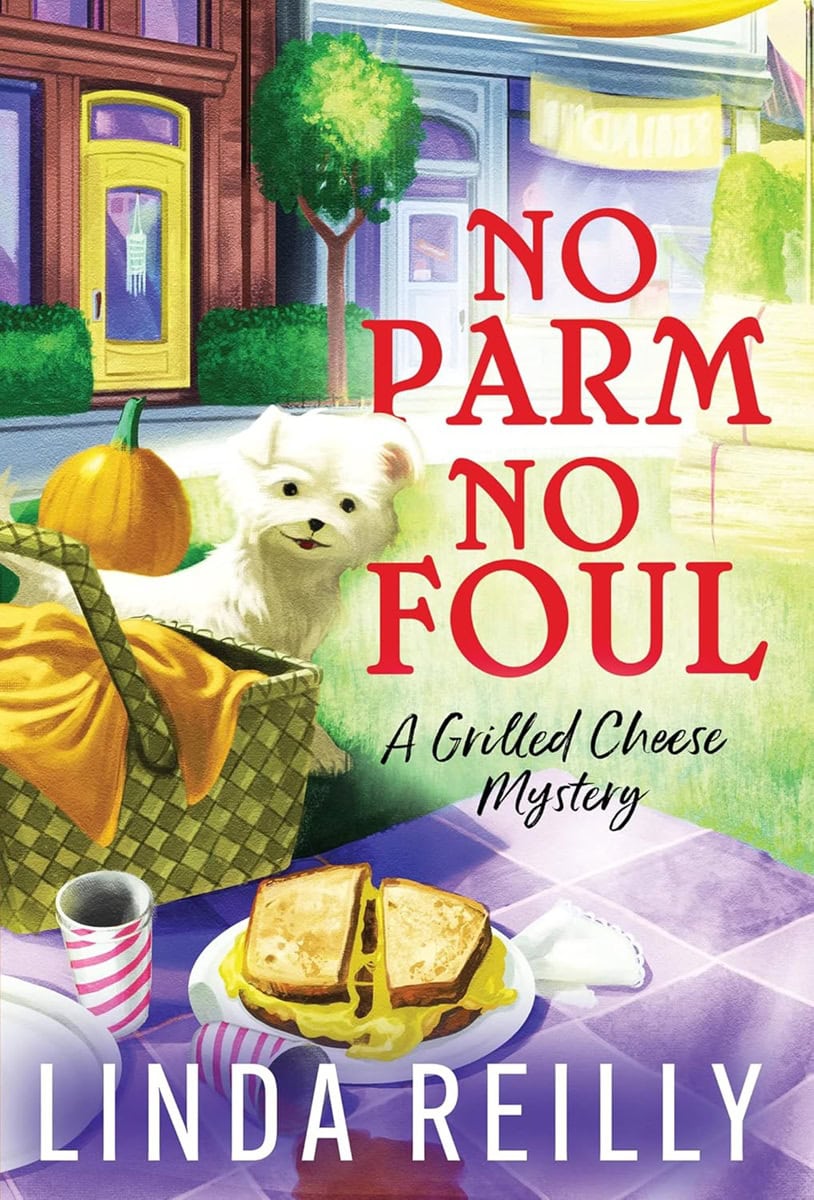 a picnic scene with a small white dog, a basket, pumpkin, and a plate of grilled cheese sandwiches on a purple checkered tablecloth; book title and author text are visible.